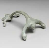 Free download Bronze oinochoe (jug) handle with lions head and female protome free photo or picture to be edited with GIMP online image editor