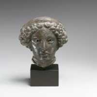 Free download Bronze relief of the head of a woman free photo or picture to be edited with GIMP online image editor