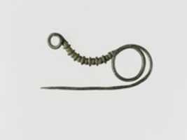 Free download Bronze serpentine-type fibula (safety pin) free photo or picture to be edited with GIMP online image editor