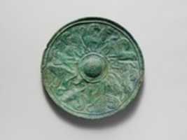 Free download Bronze shield boss with griffin and sphinx frieze free photo or picture to be edited with GIMP online image editor
