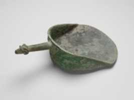 Free download Bronze shovel with a handle terminating in a rams head free photo or picture to be edited with GIMP online image editor