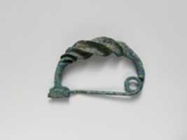 Free download Bronze spiral-type fibula (safety pin) free photo or picture to be edited with GIMP online image editor