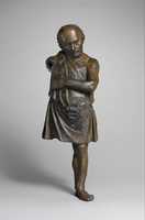 Free download Bronze statuette of an artisan with silver eyes free photo or picture to be edited with GIMP online image editor
