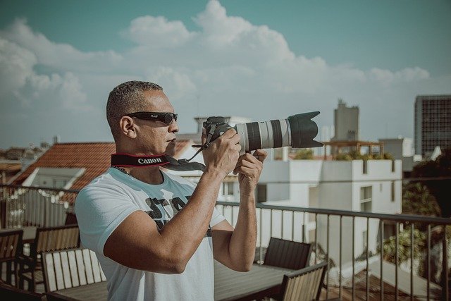 Free download cameraman photographer urban city free picture to be edited with GIMP free online image editor