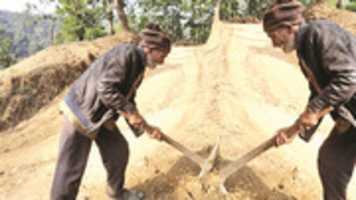 Free download chandra-bir-75-years-old-man-who-cronstruct-road- free photo or picture to be edited with GIMP online image editor