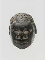 Free download Chlorite pendant in the form of the head of an African (known as Ethiopian) free photo or picture to be edited with GIMP online image editor