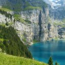 Cliffside by Lake Oeschinen in Switzerland  screen for extension Chrome web store in OffiDocs Chromium