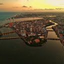 Coastal city and bridges  screen for extension Chrome web store in OffiDocs Chromium