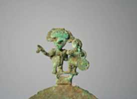 Free download Copper Disk Ornament with Musicians free photo or picture to be edited with GIMP online image editor