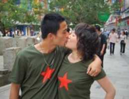 Free download Couple Kissing for a Stranger free photo or picture to be edited with GIMP online image editor