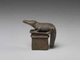 Free download Crocodile on a shrine-shaped base free photo or picture to be edited with GIMP online image editor