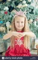 Free download cute-blonde-girl-5-years-old-with-christmas-star-decoration-near-christmas-tree-happy-new-year-2020-concept-2A846GX free photo or picture to be edited with GIMP online image editor