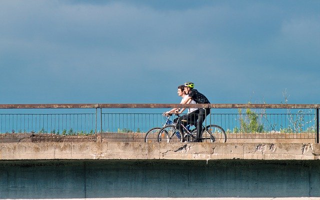 Free download cyclists people male going bicycle free picture to be edited with GIMP free online image editor