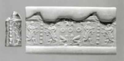 Free download Cylinder seal: royal figures flanking a standard; sphinxes free photo or picture to be edited with GIMP online image editor