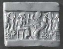 Free download Cylinder seal: seated figure holding the tail of a griffin free photo or picture to be edited with GIMP online image editor