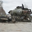 Destroyed Battle Tank on Road  screen for extension Chrome web store in OffiDocs Chromium