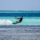exhilarating moment of surfing at a stunning beach  screen for extension Chrome web store in OffiDocs Chromium