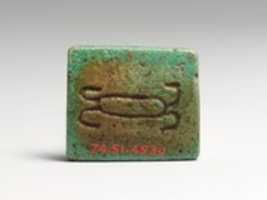 Free download Faience Wedjat-eye amulet free photo or picture to be edited with GIMP online image editor