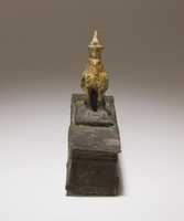 Free download Falcon in double crown surmounting a shrine shaped box for an animal mummy free photo or picture to be edited with GIMP online image editor