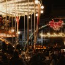 Festive Christmas Market Carousel at Night  screen for extension Chrome web store in OffiDocs Chromium