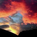 Fiery Sunset Over Mountain Silhouette  screen for extension Chrome web store in OffiDocs Chromium