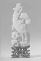 Free download Figure of a Phoenix Standing amid Carved Foliage with Peony Motifs free photo or picture to be edited with GIMP online image editor