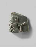 Free download Fragment of a ceremonial palette illustrating a man and a type of staff free photo or picture to be edited with GIMP online image editor