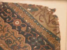 Muat turun percuma Fragment of a Northwest Parsi Medallion Carpet foto atau gambar percuma untuk diedit dengan editor imej dalam talian GIMP