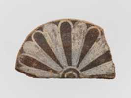 ດາວໂຫຼດຟຣີ Fragment of a terracotta antefix free photo or picture to be edited with GIMP online image editor