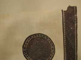 Free download Fragment with Roundel and L-Shaped Band with Interlace Ornament free photo or picture to be edited with GIMP online image editor