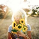 Girl holding a bouquet of flowers  screen for extension Chrome web store in OffiDocs Chromium