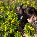 Girl in the middle of a flower garden  screen for extension Chrome web store in OffiDocs Chromium