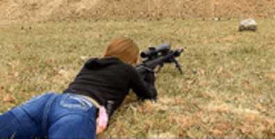 Free download Girl shooting a rifle free photo or picture to be edited with GIMP online image editor