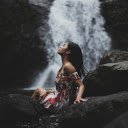 Girl sitting by the waterfall  screen for extension Chrome web store in OffiDocs Chromium