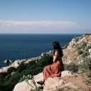 Girl watching the sea  screen for extension Chrome web store in OffiDocs Chromium