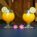 Glasses of fragrant yellow mango juice  screen for extension Chrome web store in OffiDocs Chromium