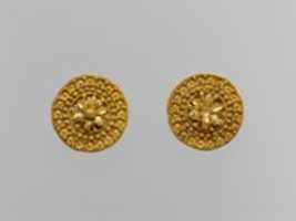 Free download Gold disks with floral motifs and lions heads free photo or picture to be edited with GIMP online image editor