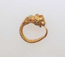 Free download Gold earring with two bulls heads free photo or picture to be edited with GIMP online image editor