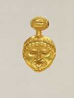 Free download Gold pendant in the form of a gorgoneion (Gorgons face) free photo or picture to be edited with GIMP online image editor