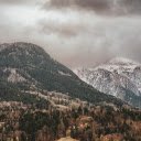 High mountains and trees  screen for extension Chrome web store in OffiDocs Chromium