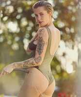 Free download Ireland Baldwin wearing green clothes free photo or picture to be edited with GIMP online image editor