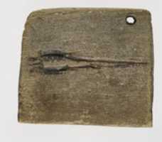 Free download Ivory label incised with an early hieroglyph that may be the image of a bundle of arrows free photo or picture to be edited with GIMP online image editor