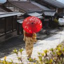 Japanese girl holding a red umbrella walking  screen for extension Chrome web store in OffiDocs Chromium