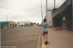 Free download Jordan In Front Of The Royal Bank, Main Street, Hanna Summer 2002 free photo or picture to be edited with GIMP online image editor