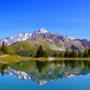 lakes, mountains, blue clouds  screen for extension Chrome web store in OffiDocs Chromium