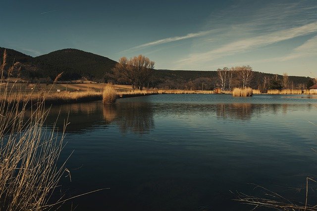 Free download lake water mountains hills grass free picture to be edited with GIMP free online image editor