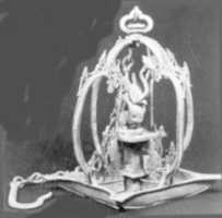 Free download Lamp with Makara and Four Wajang Figures free photo or picture to be edited with GIMP online image editor
