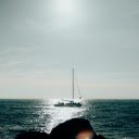 Landscape Photography of a Sailboat at Sea  screen for extension Chrome web store in OffiDocs Chromium