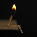 Lighted Matchstick on Brown Wooden Surface  screen for extension Chrome web store in OffiDocs Chromium