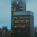Lights in Windows of Glass Skyscrapers in City  screen for extension Chrome web store in OffiDocs Chromium